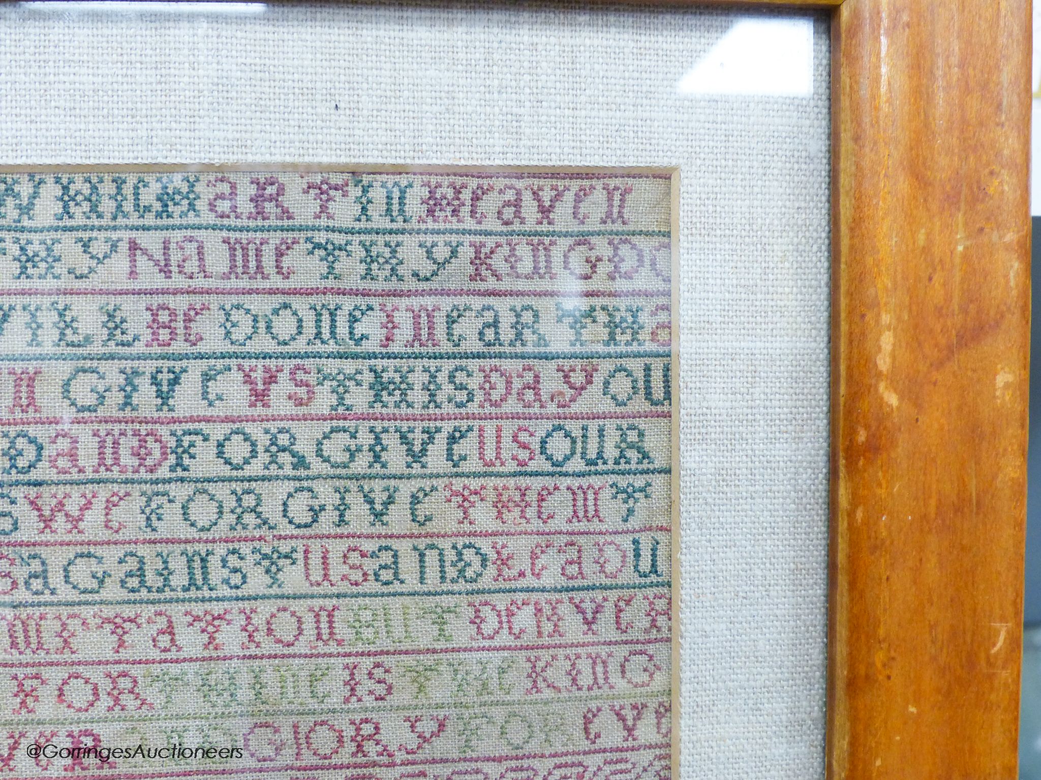 A George II needlework sampler, worked with the Lord's Prayer and religious text, by Alice Wood, dated 1736, 40 x 20cm